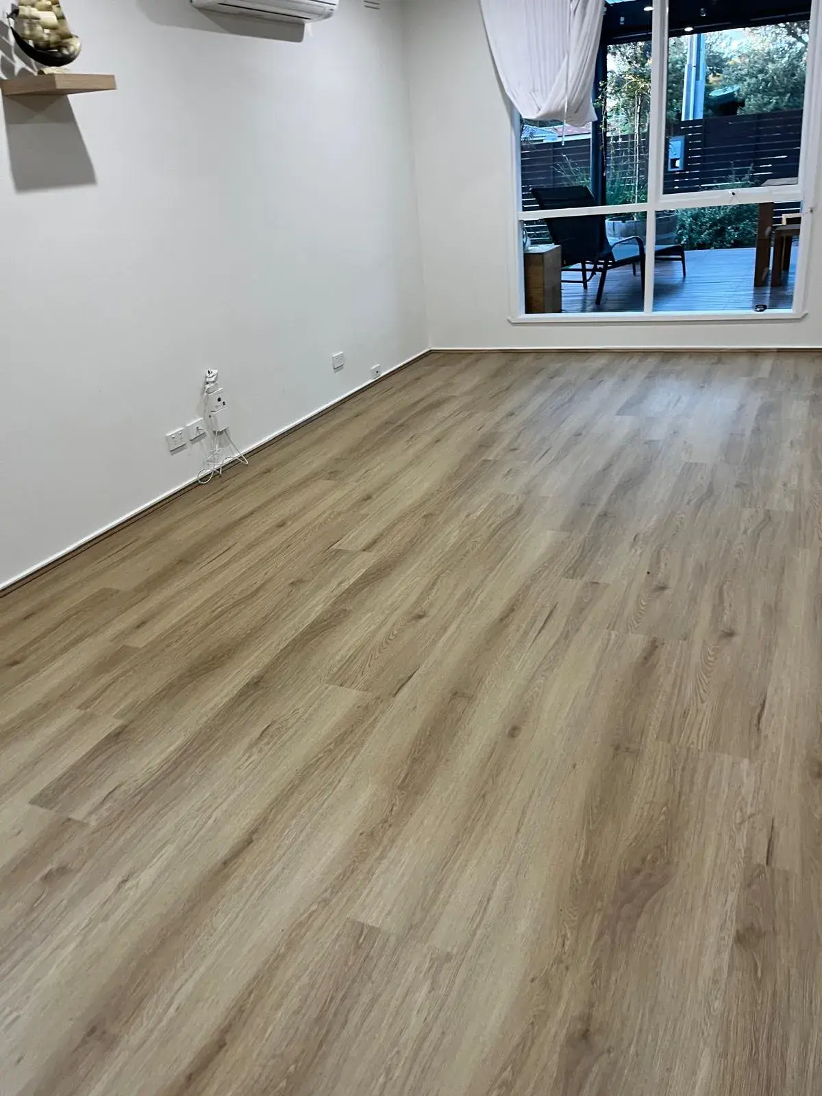Premium hybrid flooring installation in a modern living room