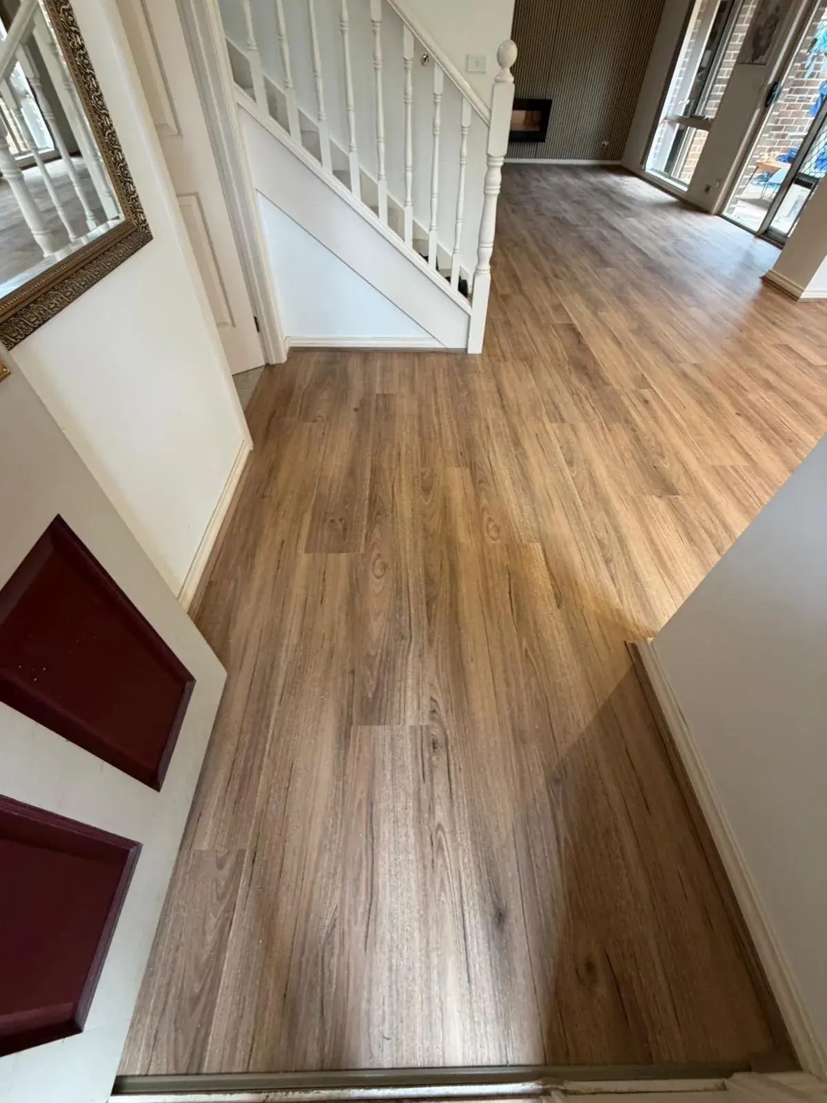 Pale Oak hybrid flooring in a minimalist bedroom design